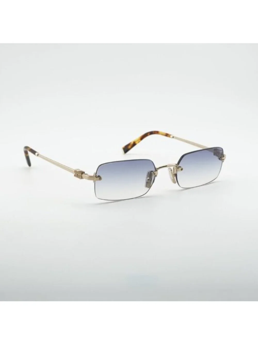 Miu Miu MUB50S ZVN80O Sunglasses Gold Rectangle Frame, Light Blue Lenses